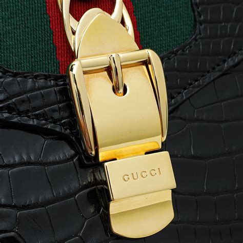 gucci shiny black top